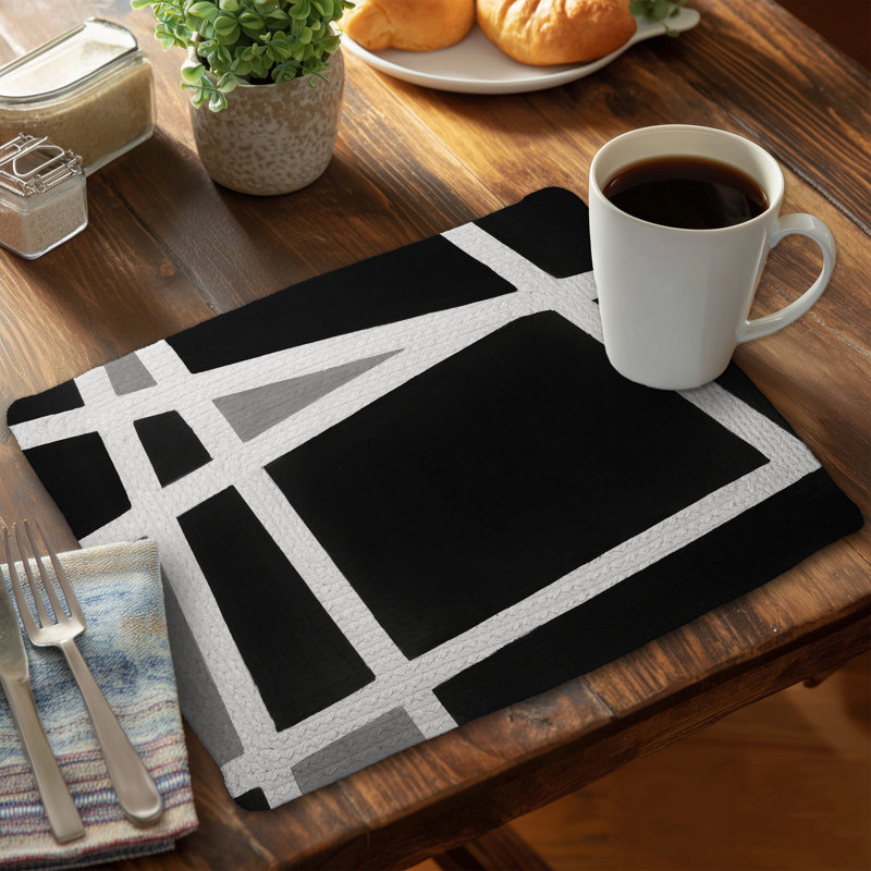 Ensemble de 4 napperons en polyester tressé | Noir et blanc abstrait