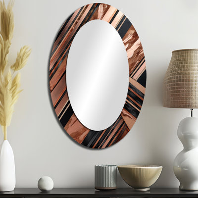 Miroir mural ovale sur métal doré