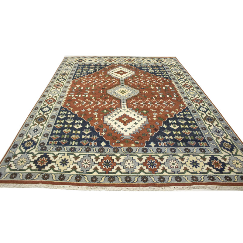 Tapis oriental rouille 9 x 12