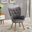 Fauteuil d'appoint contemporain à dossier capitonné en velours-129882303