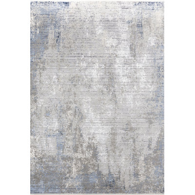 Tapis intérieur / extérieur gris / bleu à motif abstrait Whitbourne