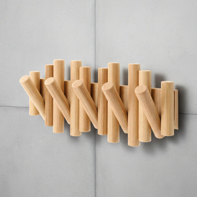 Wall-Mounted Coat Rack With 5 Extendable Wooden Pegs. Modern Style, Space-Saving Clothing Storage Rack, Natural Color.