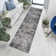 Tapis de couloir gris en polyester tissé à la machine Tamia