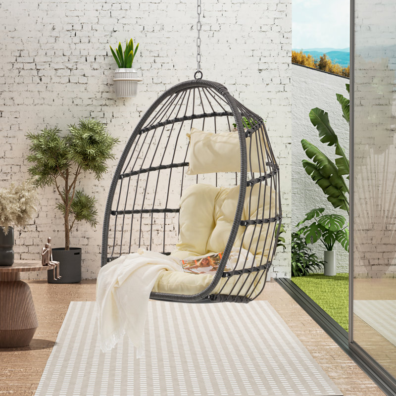 Outdoor Garden Rattan Egg Swing Chair with Steel Frame, Comfortable Cushion, and Handwoven Design for Relaxation, Beige