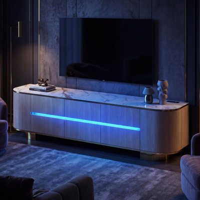 Meuble télé 82,7 po DEL moderne avec prise de courant et plateau UV en marbre ultrabrillant, console multimédia incurvée avec 6 tiroirs