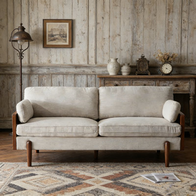 Canapé Mid-Century moderne avec revêtement beige, structure compacte et rembourrage très moelleux pour un confort et un style ultimes