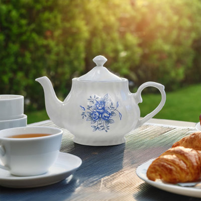 Quiana 37-oz porcelain teapot with lid, floral embossed & sterling silver trim