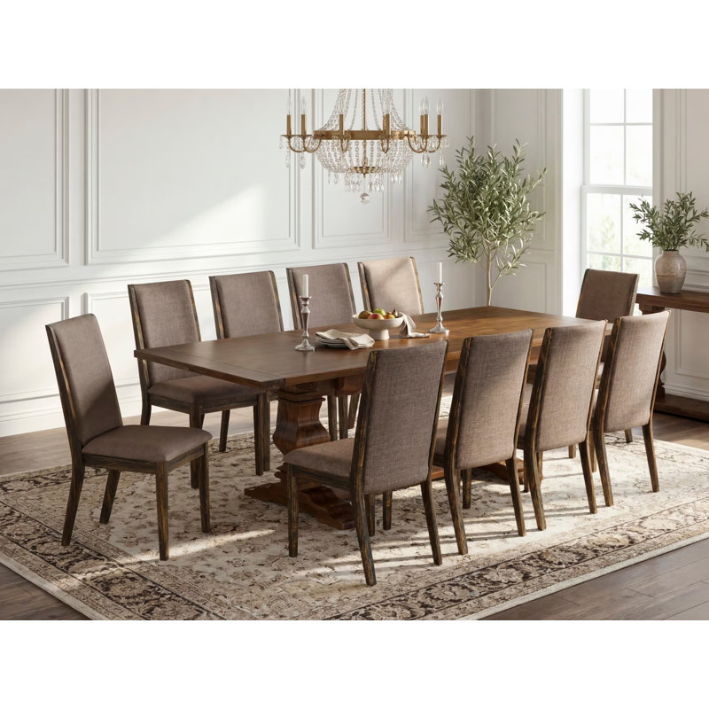 L'ensemble de table de salle à manger 11 pièces comprend une table rectangulaire en bois avec rallonge amovible et 10 chaises rembourrées en tissu kaki foncé, noyer antique