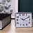 Analog Battery-Operated Alarm Tabletop Clock in Silver/Black