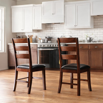 Chaise de salle à manger combinant salle à manger et détails en bois massif avec assise rembourrée et sièges rembourrés