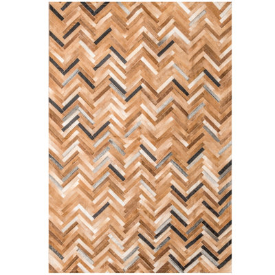 De Los Bosques Cowhide Area Rug