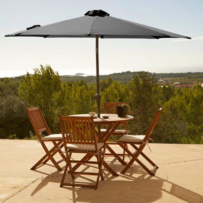 Nayoun 4 - Person Wood Patio Dining Set with Round Table