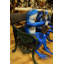 Statue de grenouilles musicales sur un banc Florentina