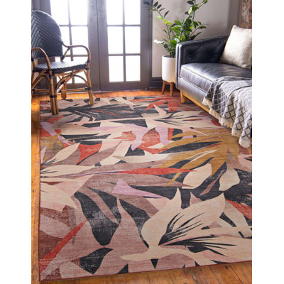 Tapis orange lavable floral Kivett