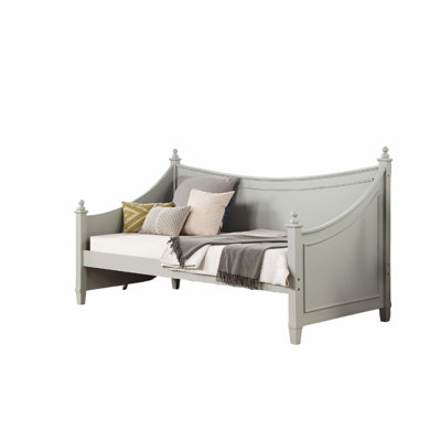 Transitional Twin Daybed with Molding Design, Finials, Solid Wood Frame, and Mattress-Ready Poster Style in White Finish.