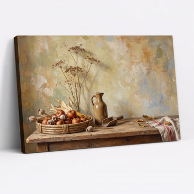 Tableau sur toile représentant un panier de pommes rouges et d'épis de maïs sur une table en bois