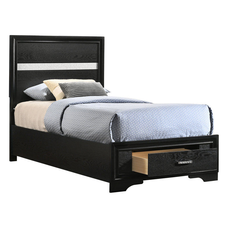 Ensemble de chambre à coucher Isadora noir pour lit simple, comprenant un lit avec panneau de rangement, une commode et une table de chevet.