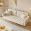 Un canapé-lit de 69,7 pouces de long recouvert de tissu de velours, avec une garniture cloutée et un coussin décoratif assorti-350236135