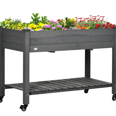 Jardinière surélevée, 119 x 56 x 84 cm, gris foncé - Bois surélevé avec roulettes verrouillables, tablette de rangement et drainage pour terrasse et jardin.