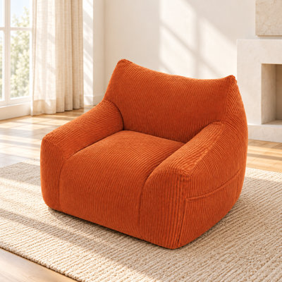 Fauteuil relax une place, pouf moelleux en velours côtelé doux avec poche latérale, design nuage douillet.