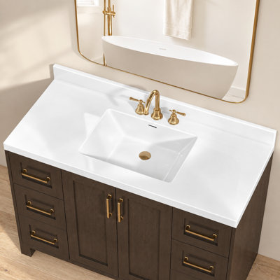 Plan de toilette blanc de 122 cm (48 po) en surface solide avec lavabo central intégré, dosseret de 9 cm (3,5 po) et 3 trous prépercés pour robinet à entraxe de 20 cm (8 po).