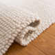 Charvik Solid Color Handmade Area Rug in Ivory