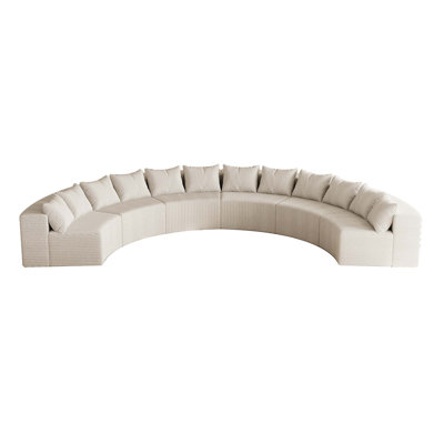 Comfortable Cazares Curved Sectional Sofa with Multiple Pillows for Various Rooms