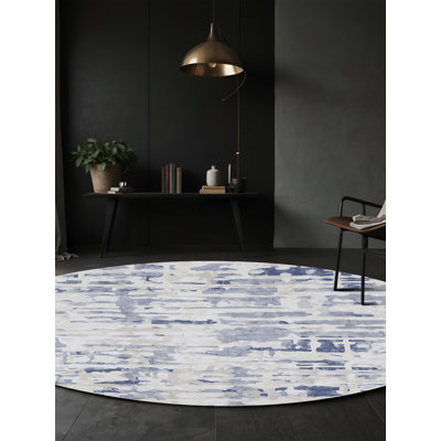 Tapis gris soyeux et moelleux