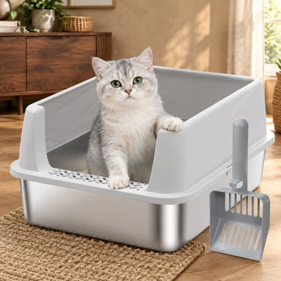 Small stainless steel litter box for kittens combines a low entrance with high sides to help prevent urine leakage; the non-sticky metal pan is easy to clean and includes both a scoop and mat.