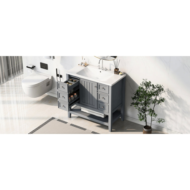 Meuble-lavabo de salle de bain moderne autoportant 36 po avec lavabo arrondi en céramique blanche, une porte d'armoire, trois tiroirs, construction en bois massif et finition grise, montage sur robinet encastré de 4 po, assemblage