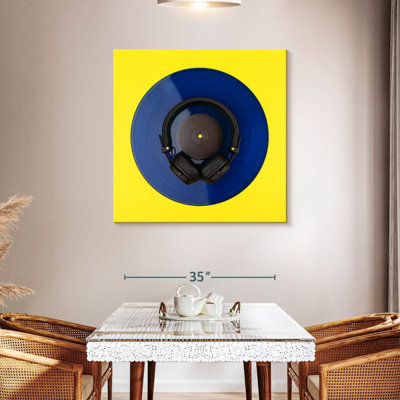 Abarca Headphones On Vinyl Record