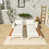 Coussin beige / structure blanche est en rupture de stock