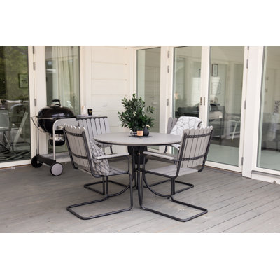 Bjarne 4 - Person Patio Dining Set with Round Table
