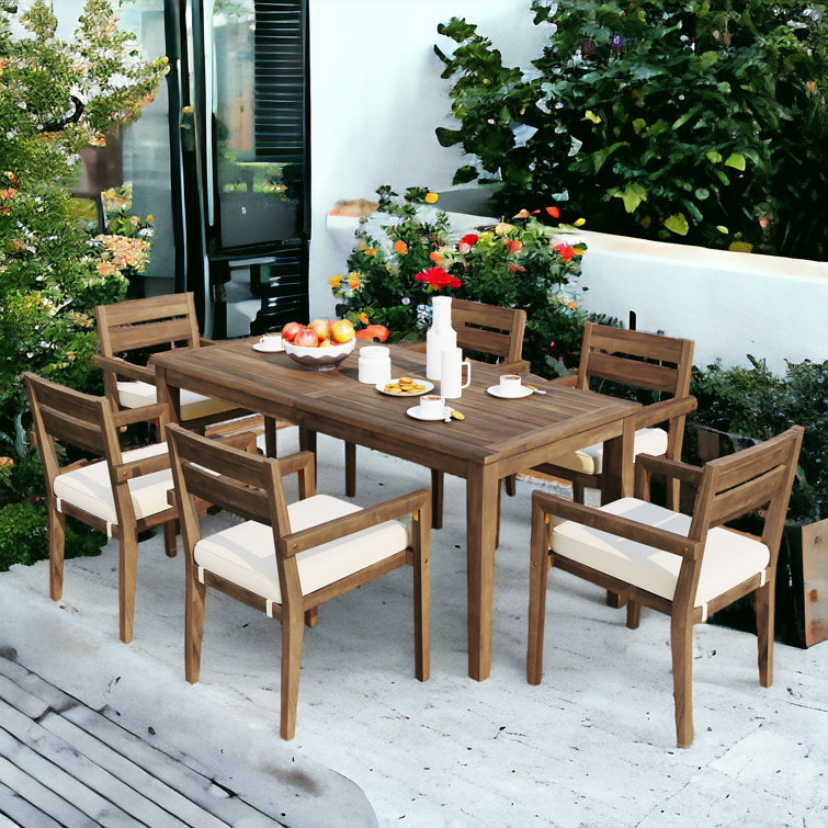 https://assets.wfcdn.com/im/14017446/resize-h755-w755%5Ecompr-r85/2734/273437799/Ingimund+6+-+Person+Rectangular+Outdoor+Dining+Set+with+Cushions.jpg