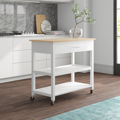 Behling Solid Butcher Block Kitchen Island with Baskets and Storage Shelf