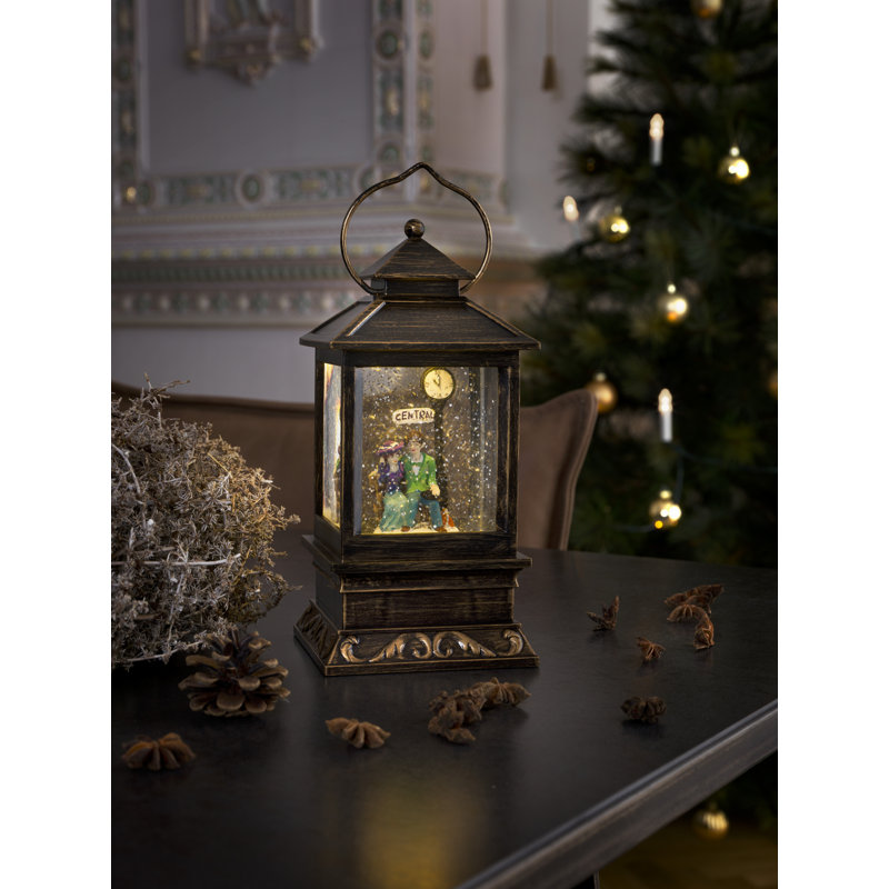 Snow Lantern with Seated Couple on a Bench