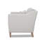 Fauteuil beige confortable avec pieds en chêne et mousse haute et revêtement en bois massif