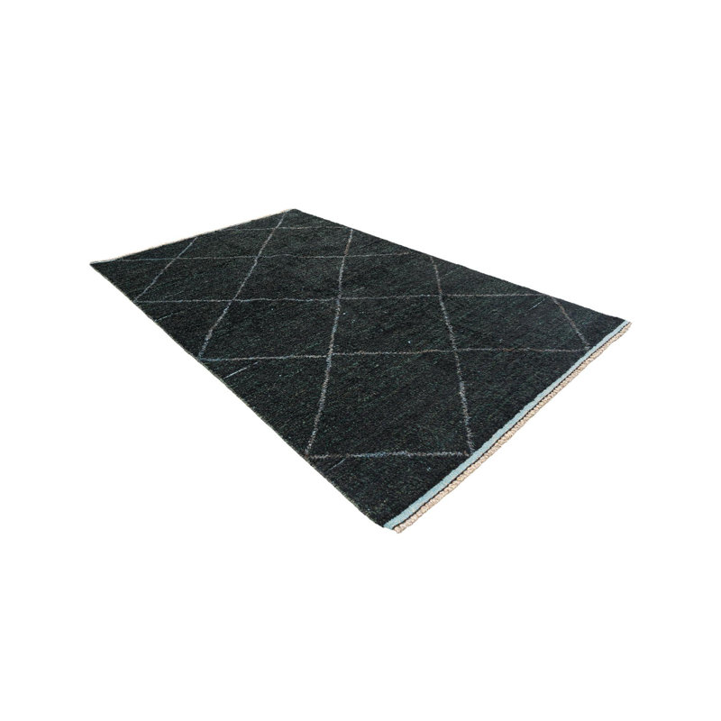 Tapis noir Kalmanovitz