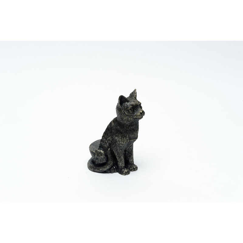Pieds de jardinière couleur chat en bronze assis dans une boîte cadeau
