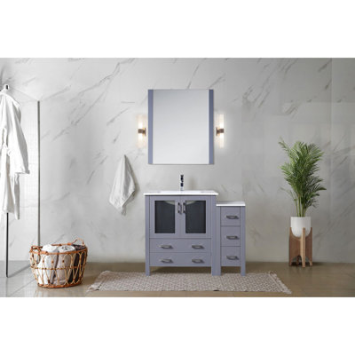 Meuble-lavabo simple gris foncé de 107 cm de large avec armoire latérale, comptoir en céramique blanche, structure en bois massif, tiroirs à fermeture amortie, garde-robe intérieure pour le rangement, préteinture durable du comptoir