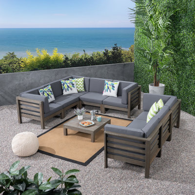 Ajanai Outdoor 9 Piece Sectional Seating Group with Cushions