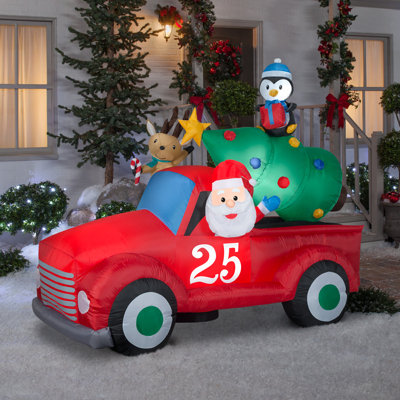 Lumières de Noël Airblown® Père Noël gonflable dans un camion d'époque
