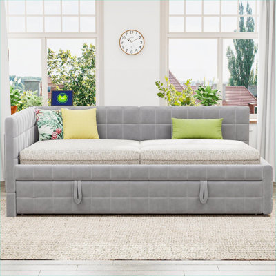 Lit de jour double en L doux et rembourré gris avec couchette simple escamotable et ports USB pour chambre d'amis