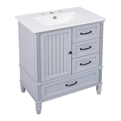 Meuble-lavabo élégant avec lavabo, rangement spacieux et caractéristiques haut de gamme pour un espace de salle de bain fonctionnel et élégant.