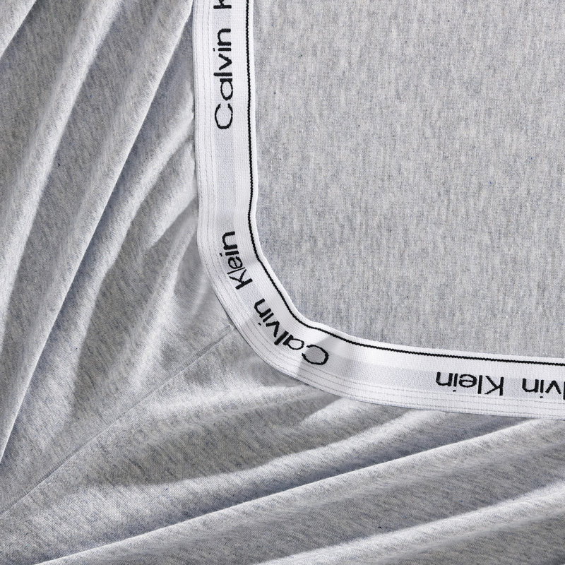 Ensemble de draps 4 pièces Calvin Klein, Ensemble de draps pour grand lit avec 2 taies d'or, Bleu aqua