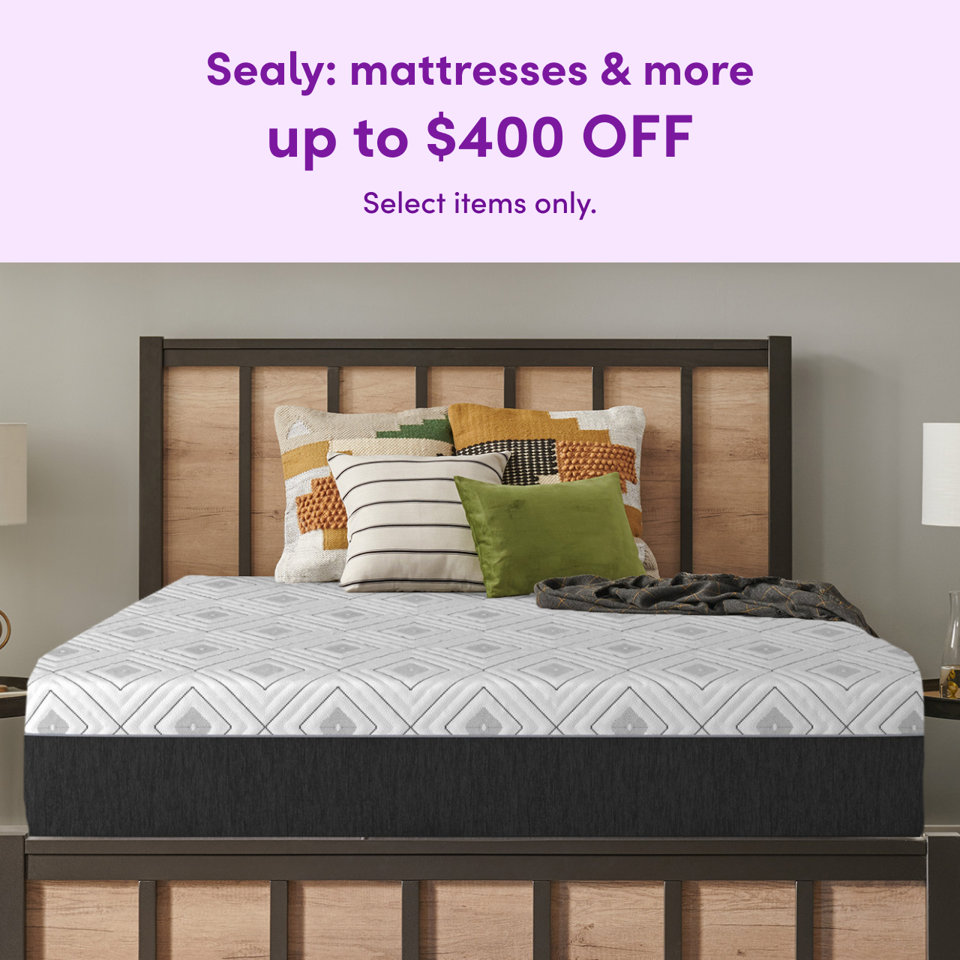 Sealy mattresses and more up to $400 off on select items featuring a bedroom with a modern bed frame and patterned mattress.