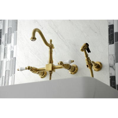 Kingston Brass Heritage Double-Handle 3-Hole Wall-Mount Bridge Kitchen Faucet with Brass Sprayer