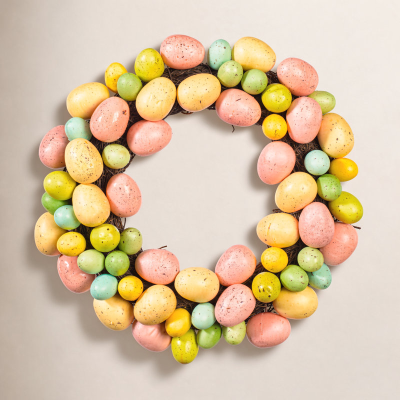 Vickerman 13" Artificial Pastel Easter Egg Wreath on a grapevine base.