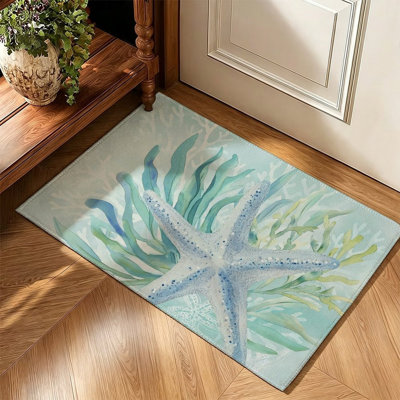 Tapis de sol botanique bleu sarcelle clair à motif de feuilles 47" x 31"