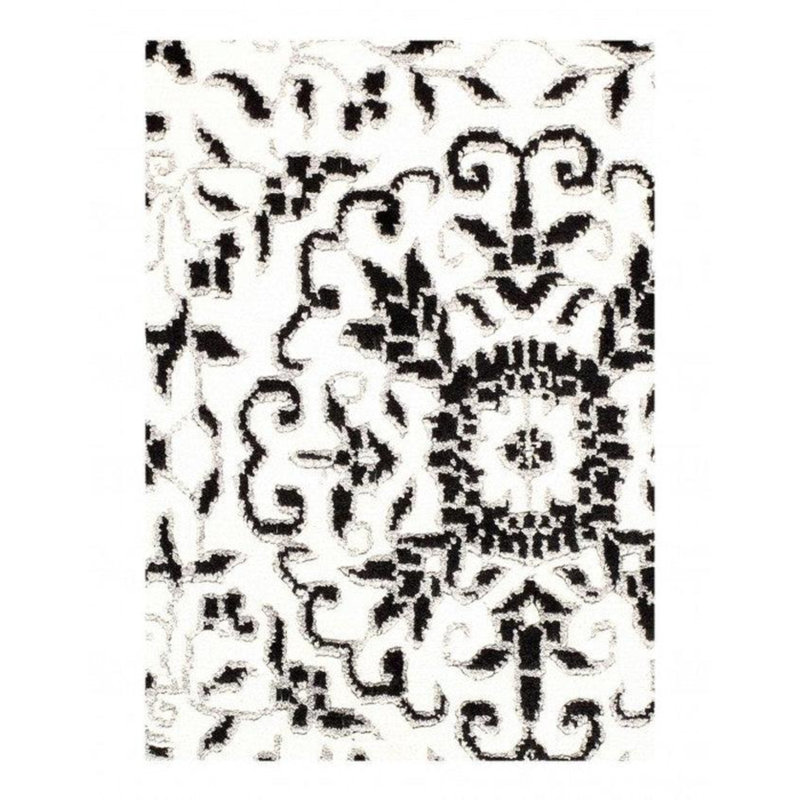 Niviah Floral Area Rug in White